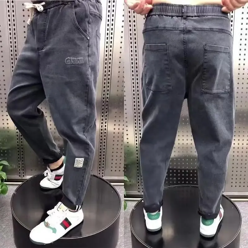 Harajuku Stretch Korea Streetwear רופף ג'ינס ג'ינס מוצק מותן אלסטי לגברים אביב קיץ חדש פלוס מידה 7XL 8XL מכנסיים מזדמנים