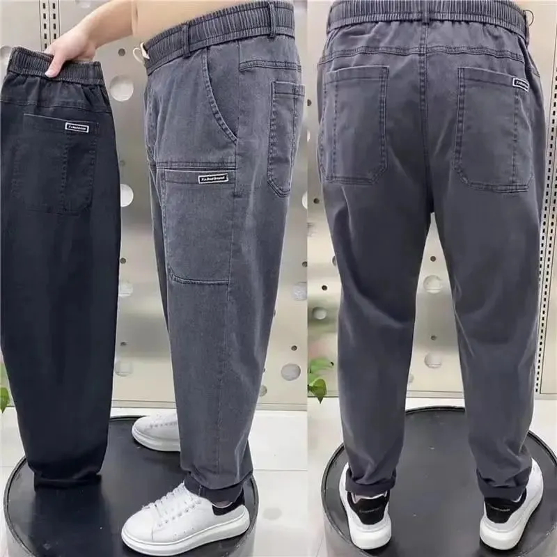 Harajuku Stretch Korea Streetwear רופף ג'ינס ג'ינס מוצק מותן אלסטי לגברים אביב קיץ חדש פלוס מידה 7XL 8XL מכנסיים מזדמנים