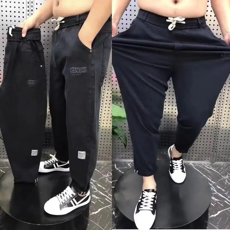 Harajuku Stretch Korea Streetwear רופף ג'ינס ג'ינס מוצק מותן אלסטי לגברים אביב קיץ חדש פלוס מידה 7XL 8XL מכנסיים מזדמנים
