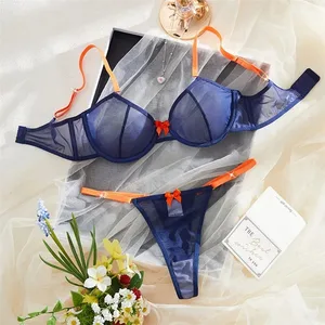 Lingerie da donna Blu navy Intimo a rete trasparente Anelli in acciaio Reggiseno Perizoma con fiocco arancione 2 Pezzi Lingerie sexy Intimo di colore a contrasto